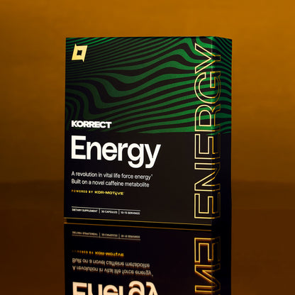 KORRECT Energy supplement box on a reflective surface with a brown background